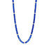 The Midnight Tri-Tone Twilight Oval Station Tennis Necklace, by Midnight, features vibrant blue stones and small silver beads interspersed with 14K matte gold accents. The uniform arrangement exudes a simple yet elegant design, presented against a white background.